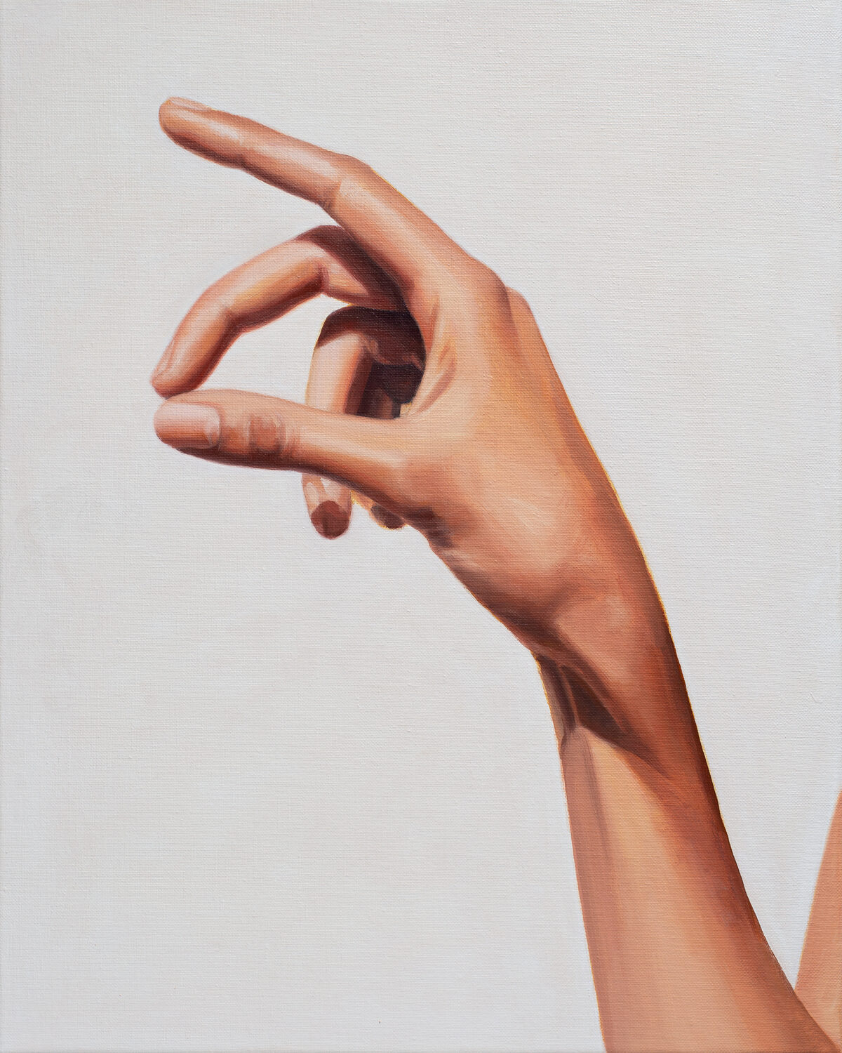 Abi Huxtable — Cropped image of a hand set against a white background